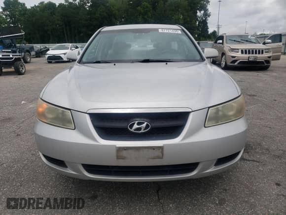 2006 Hyundai Sonata GL z VIN KMHET46CX6A079083, wystawiony jako Copart lot #67721435 z przebiegiem 199 046 mil mil oraz Szkoda całkowita • Salvage title. Historia ofert i sprzedaży dostępna na DreamBid. Obrazek 5.