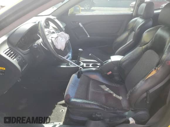 2005 Hyundai Tiburon GT z VIN KMHHN65F75U170498, wystawiony jako Copart lot #58391985 z przebiegiem 190 374 mil mil oraz Szkoda całkowita • Salvage title. Historia ofert i sprzedaży dostępna na DreamBid. Obrazek 7.