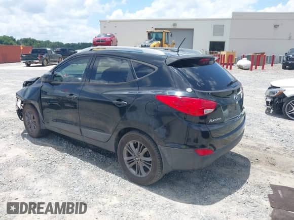 2014 Hyundai Tucson Limited with VIN KM8JU3AG1EU795688, listed as a IAAI auction lot 42780863 with 158,638 mi miles and . Bid and sale history available at DreamBid. Image 3.