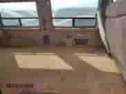 2003 Ford Econoline Cargo Recreational with VIN 1FDRE14W93HA74225, listed as a Copart auction lot 76162714 with 250,480 mi miles and Salvage title. Bid and sale history available at DreamBid. Image 11.