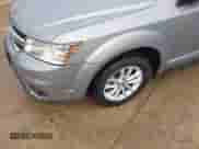 2015 Dodge Journey SXT z VIN 3C4PDCBG3FT628063, wystawiony jako IAAI lot #43216943 z przebiegiem 141 916 mil mil oraz . Historia ofert i sprzedaży dostępna na DreamBid. Obrazek 13.
