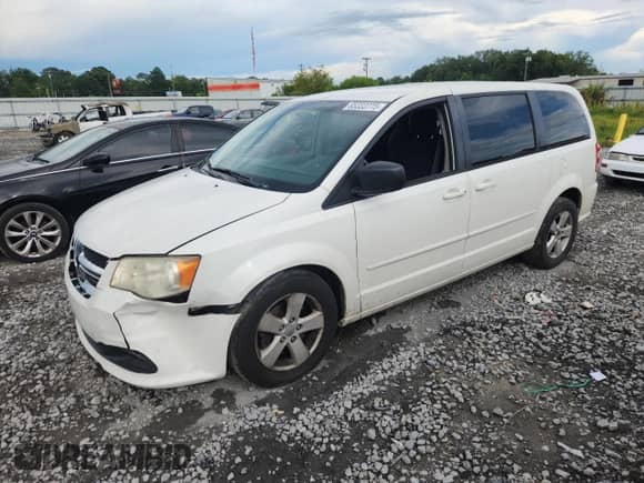 2013 Dodge Grand Caravan SE with VIN 2C4RDGBG2DR786975, listed as a Copart auction lot 65333775 with 183,378 mi miles and Salvage title. Bid and sale history available at DreamBid. Image 1.