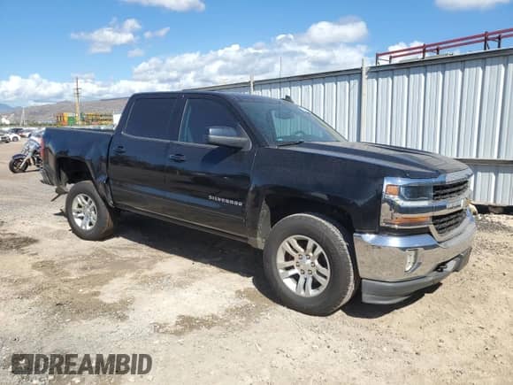2017 Chevrolet Silverado 1500 LT with VIN 3GCPCREH2HG125128, listed as a Copart auction lot 83224824 with 93,467 mi miles and Salvage title. Bid and sale history available at DreamBid. Image 4.