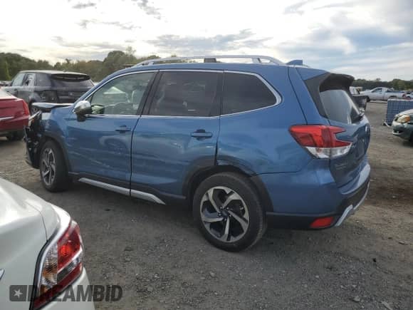 2022 Subaru Forester Touring z VIN JF2SKARC6NH432754, wystawiony jako Copart lot #80829635 z przebiegiem 28 991 mil mil oraz Nie do naprawy • Non repairable. Historia ofert i sprzedaży dostępna na DreamBid. Obrazek 2.