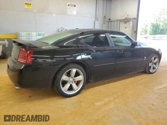 2007 Dodge Charger SRT-8 with VIN 2B3KA73W67H652417, listed as a Copart auction lot 70518705 with 75,440 mi miles and Salvage title. Bid and sale history available at DreamBid. Image 3.