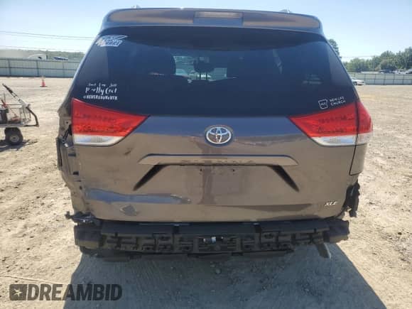 2013 Toyota Sienna XLE AAS with VIN 5TDYK3DC0DS385873, listed as a Copart auction lot 71836015 with 192,811 mi miles and Salvage title. Bid and sale history available at DreamBid. Image 6.