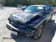 2002 Dodge Dakota Sport z VIN 1B7HL38X92S682123, wystawiony jako IAAI lot #41868635 z przebiegiem 312 448 mil mil oraz . Historia ofert i sprzedaży dostępna na DreamBid. Obrazek 2.