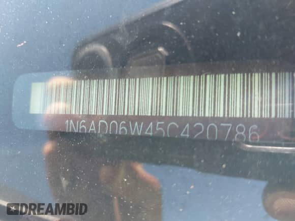 2005 Nissan Frontier SE with VIN 1N6AD06W45C420786, listed as a IAAI auction lot 43345200 with 231,675 mi miles and . Bid and sale history available at DreamBid. Image 12.