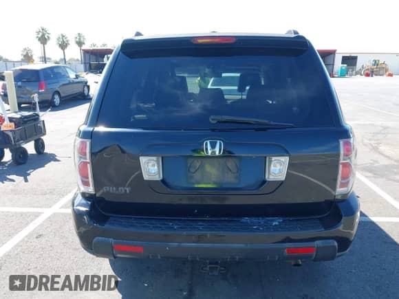 2006 Honda Pilot EX-L z VIN 5FNYF28506B016626, wystawiony jako IAAI lot #43056380 z przebiegiem 284 203 mil mil oraz . Historia ofert i sprzedaży dostępna na DreamBid. Obrazek 16.