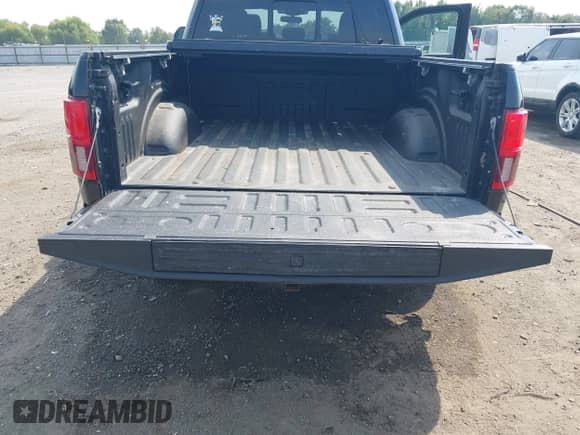 2019 Ford F-150 Lariat with VIN 1FTFW1E46KFD14388, listed as a IAAI auction lot 43253158 with 103,734 mi miles and . Bid and sale history available at DreamBid. Image 17.