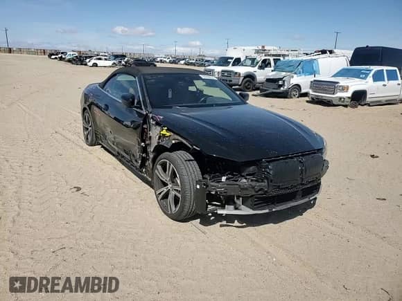 2023 BMW 4 Series 430i z VIN WBA23AT02PCL58336, wystawiony jako Copart lot #50940835 z przebiegiem 22 680 mil mil oraz Szkoda całkowita • Salvage title. Historia ofert i sprzedaży dostępna na DreamBid. Obrazek 11.