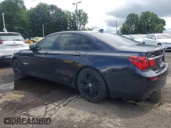 2014 BMW 7 Series 750i xDrive with VIN WBAYB6C58ED225139, listed as a Copart auction lot 63944075 with 155,046 mi miles and Clean title. Bid and sale history available at DreamBid. Image 2.