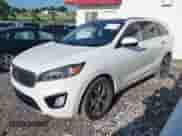 2016 Kia Sorento SXL with VIN 5XYPK4A59GG115064, listed as a IAAI auction lot 42529912 with 103,077 mi miles and . Bid and sale history available at DreamBid. Image 2.