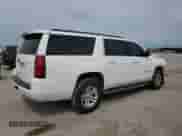 2015 Chevrolet Suburban LT z VIN 1GNSCJKCXFR278235, wystawiony jako Copart lot #53805964 z przebiegiem 188 888 mil mil oraz Szkoda całkowita • Salvage title. Historia ofert i sprzedaży dostępna na DreamBid. Obrazek 3.