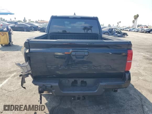 2025 Toyota Tacoma SR5 with VIN 3TMKB5FN0SM041246, listed as a Copart auction lot 80586875 with 4,746 mi miles and Salvage title. Bid and sale history available at DreamBid. Image 6.