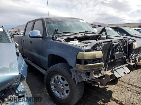 2001 Chevrolet Silverado 2500HD LS с VIN 1GCHC23U21F166670, выставлен на аукционе Copart как лот 41898125 с пробегом Не указан миль и На запчасти • Non repairable. История ставок и продаж доступна на DreamBid. Изображение 4.