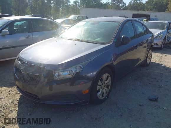 2013 Chevrolet Cruze LS z VIN 1G1PA5SH6D7168517, wystawiony jako IAAI lot #43256208 z przebiegiem 137 199 mil mil oraz . Historia ofert i sprzedaży dostępna na DreamBid. Obrazek 17.