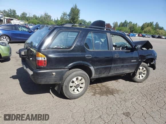 1998 Honda Passport LX с VIN 4S6CM58WXW4417444, выставлен на аукционе Copart как лот 55157355 с пробегом Не указан миль и Списание • Salvage title. История ставок и продаж доступна на DreamBid. Изображение 3.