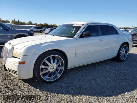 2006 Chrysler 300 with VIN 2C3KA43R46H388656, listed as a Copart auction lot 82635565 with 309,784 mi miles and Salvage title. Bid and sale history available at DreamBid. Image 1.