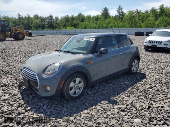 2014 MINI Hardtop with VIN WMWXM5C51ET933450, listed as a Copart auction lot 56686374 with 82,100 mi miles and Salvage title. Bid and sale history available at DreamBid. Image 1.