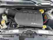 2017 Dodge Grand Caravan SE with VIN 2C4RDGBGXHR648641, listed as a Copart auction lot 68714615 with 153,290 mi miles and Salvage title. Bid and sale history available at DreamBid. Image 11.