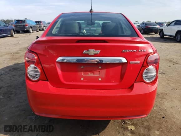 2016 Chevrolet Sonic LTZ with VIN 1G1JE5SB8G4159569, listed as a Copart auction lot 81649135 with 77,961 mi miles and Salvage title. Bid and sale history available at DreamBid. Image 6.