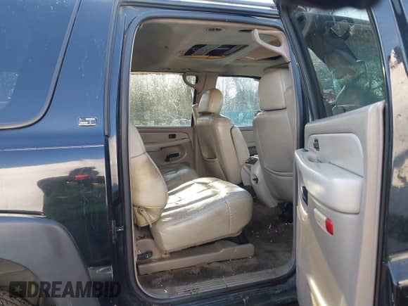 2002 Chevrolet Suburban Z71 z VIN 3GNFK16Z42G199561, wystawiony jako IAAI lot #41442707 z przebiegiem 229 823 mil mil oraz . Historia ofert i sprzedaży dostępna na DreamBid. Obrazek 8.