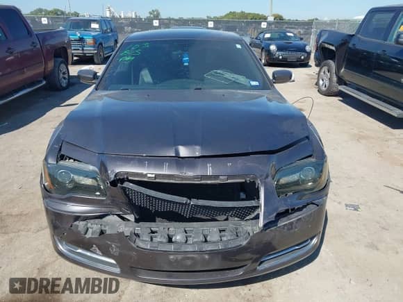 2014 Chrysler 300 with VIN 2C3CCAAG5EH157102, listed as a IAAI auction lot 43418511 with 190,718 mi miles and . Bid and sale history available at DreamBid. Image 12.