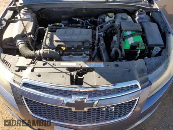 2013 Chevrolet Cruze LTZ z VIN 1G1PG5SB2D7241781, wystawiony jako Copart lot #84878285 z przebiegiem 138 387 mil mil oraz Szkoda całkowita • Salvage title. Historia ofert i sprzedaży dostępna na DreamBid. Obrazek 11.