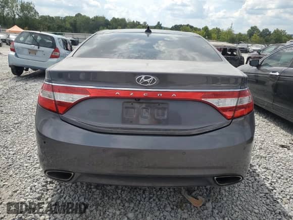 2012 Hyundai Azera с VIN KMHFH4JG7CA014039, выставлен на аукционе Copart как лот 71280805 с пробегом 165 940 миль миль и Чистый • Clean title. История ставок и продаж доступна на DreamBid. Изображение 6.
