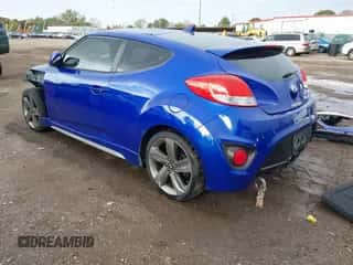 2014 Hyundai Veloster Turbo z VIN KMHTC6AE5EU192822, wystawiony jako IAAI lot #43484645 z przebiegiem 114 938 mil mil oraz . Historia ofert i sprzedaży dostępna na DreamBid. Obrazek 3.