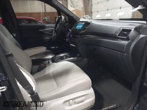 2022 Honda Passport EX-L z VIN 5FNYF8H51NB004387, wystawiony jako IAAI lot #42293741 z przebiegiem 41 689 mil mil oraz . Historia ofert i sprzedaży dostępna na DreamBid. Obrazek 5.