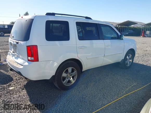 2009 Honda Pilot EX with VIN 5FNYF48439B010116, listed as a IAAI auction lot 43328991 with 184,430 mi miles and . Bid and sale history available at DreamBid. Image 4.