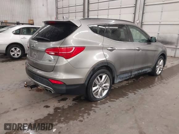 2015 Hyundai Santa Fe с VIN 5XYZWDLA1FG266258, выставлен на аукционе IAAI как лот 43472113 с пробегом 104 430 миль миль и . История ставок и продаж доступна на DreamBid. Изображение 4.