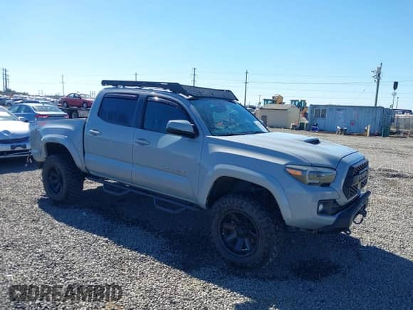 2019 Toyota Tacoma SR z VIN 5TFCZ5AN8KX193437, wystawiony jako IAAI lot #43278180 z przebiegiem 70 048 mil mil oraz . Historia ofert i sprzedaży dostępna na DreamBid. Obrazek 1.