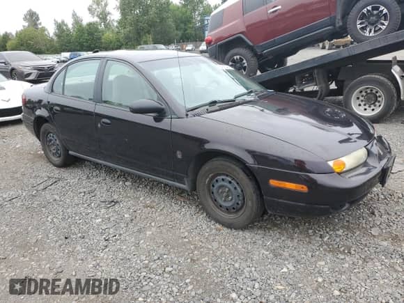 2000 Saturn SL with VIN 1G8ZH528XYZ160128, listed as a Copart auction lot 64913404 with 172,587 mi miles and Clean title. Bid and sale history available at DreamBid. Image 4.