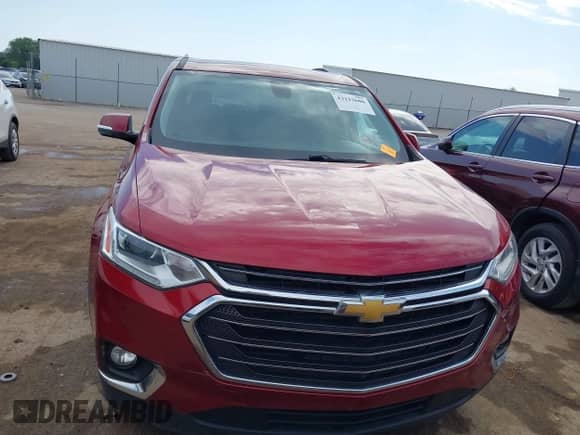 2018 Chevrolet Traverse LT with VIN 1GNERHKW1JJ116144, listed as a IAAI auction lot 43212606 with 121,318 mi miles and . Bid and sale history available at DreamBid. Image 12.