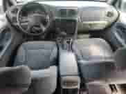 2003 Chevrolet TrailBlazer LTZ z VIN 1GNDT13S232304748, wystawiony jako Copart lot #74022404 z przebiegiem 108 472 mil mil oraz Szkoda całkowita • Salvage title. Historia ofert i sprzedaży dostępna na DreamBid. Obrazek 8.