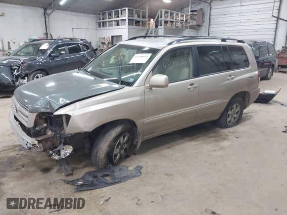 2006 Toyota Highlander with VIN JTEGP21A060098433, listed as a IAAI auction lot 43398634 with 280,235 mi miles and . Bid and sale history available at DreamBid. Image 2.