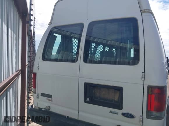 2012 Ford Econoline Cargo Commercial with VIN 1FTNS2EW1CDA41355, listed as a IAAI auction lot 43332039 with 134,489 mi miles and . Bid and sale history available at DreamBid. Image 16.