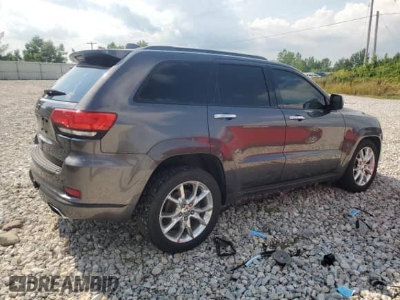 2014 Jeep Grand Cherokee Summit with VIN 1C4RJFJM7EC557471, listed as a Copart auction lot 66631675 with 187,232 mi miles and Clean title. Bid and sale history available at DreamBid. Image 3.
