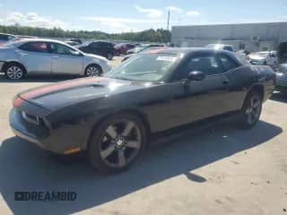 2013 Dodge Challenger Rallye Redline с VIN 2C3CDYAG9DH691689, выставлен на аукционе Copart как лот 71413435 с пробегом 174 149 миль миль и Списание • Salvage title. История ставок и продаж доступна на DreamBid. Изображение 1.