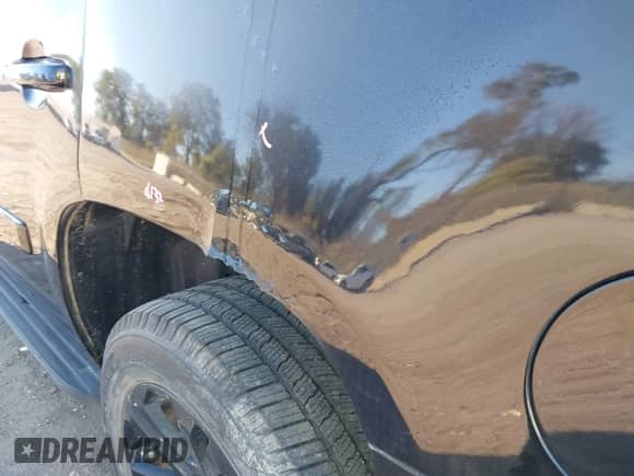 2007 Chevrolet Tahoe LTZ with VIN 1GNFK13027R249676, listed as a IAAI auction lot 43424132 with 296,751 mi miles and . Bid and sale history available at DreamBid. Image 15.