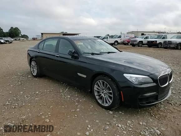2014 BMW 7 Series 740Li с VIN WBAYE4C50ED137777, выставлен на аукционе Copart как лот 69148825 с пробегом 104 472 миль миль и Списание • Salvage title. История ставок и продаж доступна на DreamBid. Изображение 13.