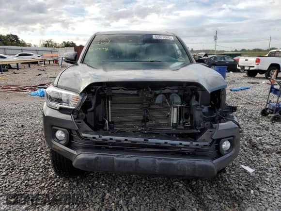 2022 Toyota Tacoma TRD Off Road with VIN 3TMCZ5AN4NM515100, listed as a Copart auction lot 84576995 with 33,917 mi miles and Salvage title. Bid and sale history available at DreamBid. Image 5.