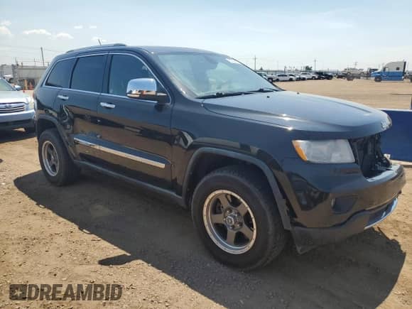 2012 Jeep Grand Cherokee Overland with VIN 1C4RJFCT4CC105320, listed as a Copart auction lot 67323475 with 54,779 mi miles and Salvage title. Bid and sale history available at DreamBid. Image 4.