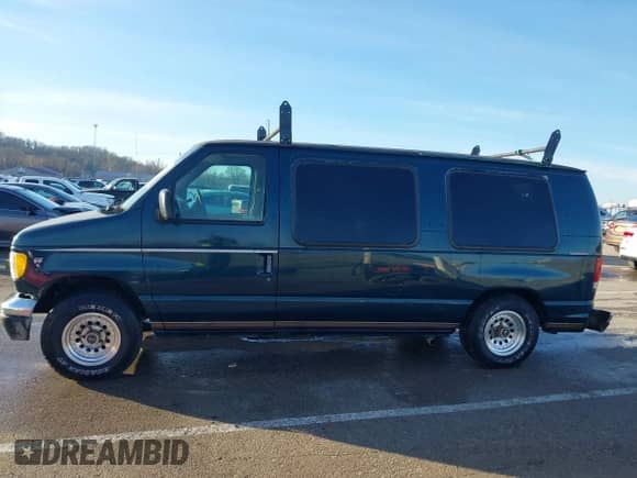 1998 Ford Econoline Cargo Recreational z VIN 1FDRE1463WHB01066, wystawiony jako IAAI lot #41482396 z przebiegiem 269 648 mil mil oraz . Historia ofert i sprzedaży dostępna na DreamBid. Obrazek 14.