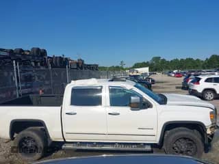 2015 GMC Sierra 1500 SLT z VIN 3GTU2VEC0FG510137, wystawiony jako IAAI lot #43068872 z przebiegiem 185 004 mil mil oraz . Historia ofert i sprzedaży dostępna na DreamBid. Obrazek 1.