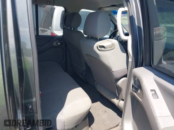 2005 Nissan Frontier SE with VIN 1N6AD07U55C451431, listed as a IAAI auction lot 43148074 with 235,494 mi miles and . Bid and sale history available at DreamBid. Image 8.