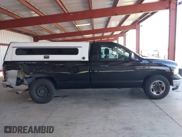 2005 Dodge 2500 SLT with VIN 3D7KR26DX5G859013, listed as a IAAI auction lot 42713721 with 232,700 mi miles and . Bid and sale history available at DreamBid. Image 13.